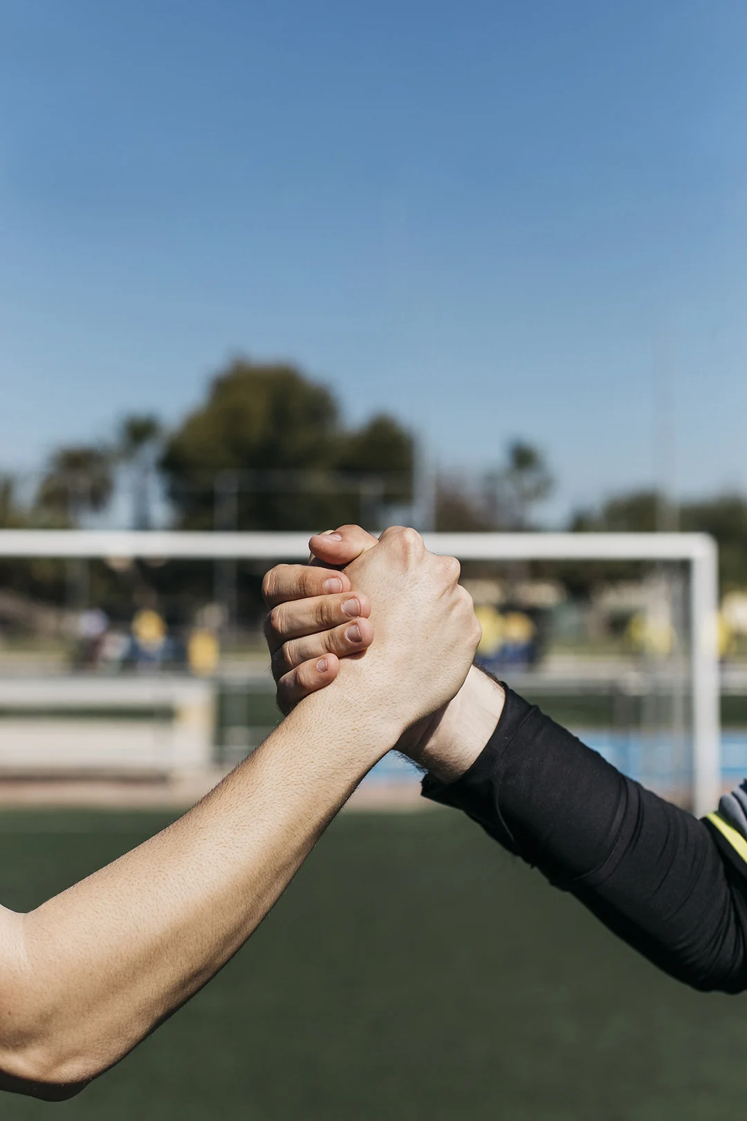Football Players Shaking Hands